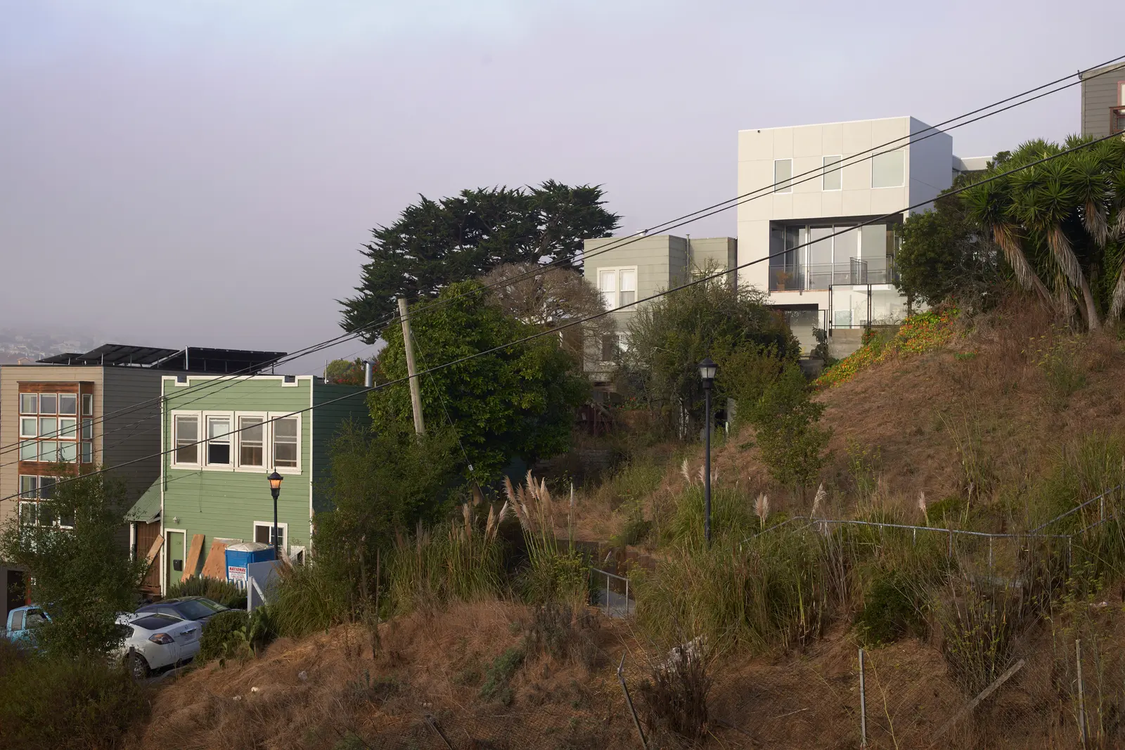 Billboard House, a small residential project in Bernal Heights, San Francisco, set within a steep urban landscape.