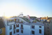 Birkegade Rooftop terrace with planting and paved paths above the residential block, Copenhagen, Denmark