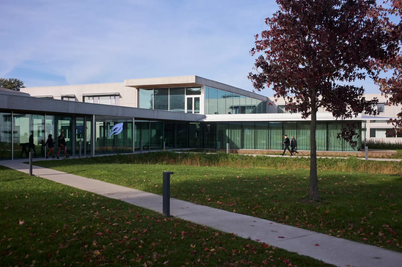 Campus International Lesaffre at dusk in Marcq-en-Barœul, France, designed by Tank Architectes, Photography Julien Lanoo