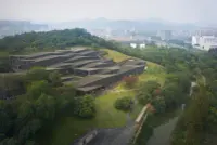 China Academy of Arts’ Folk Art Museum in Hangzhou by Kengo Kuma, set among tea gardens and reused roof tiles, Photography Julien Lanoo