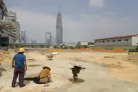 China Resources Tower under construction in Shenzhen, China, designed by Kohn Pedersen Fox Associates, with exposed structure and scaffolding. Photography Julien Lanoo