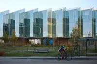DISC in Cambridge, United Kingdom, by Herzog & de Meuron, with a precise façade and daylight-filled interior, Photography Julien Lanoo