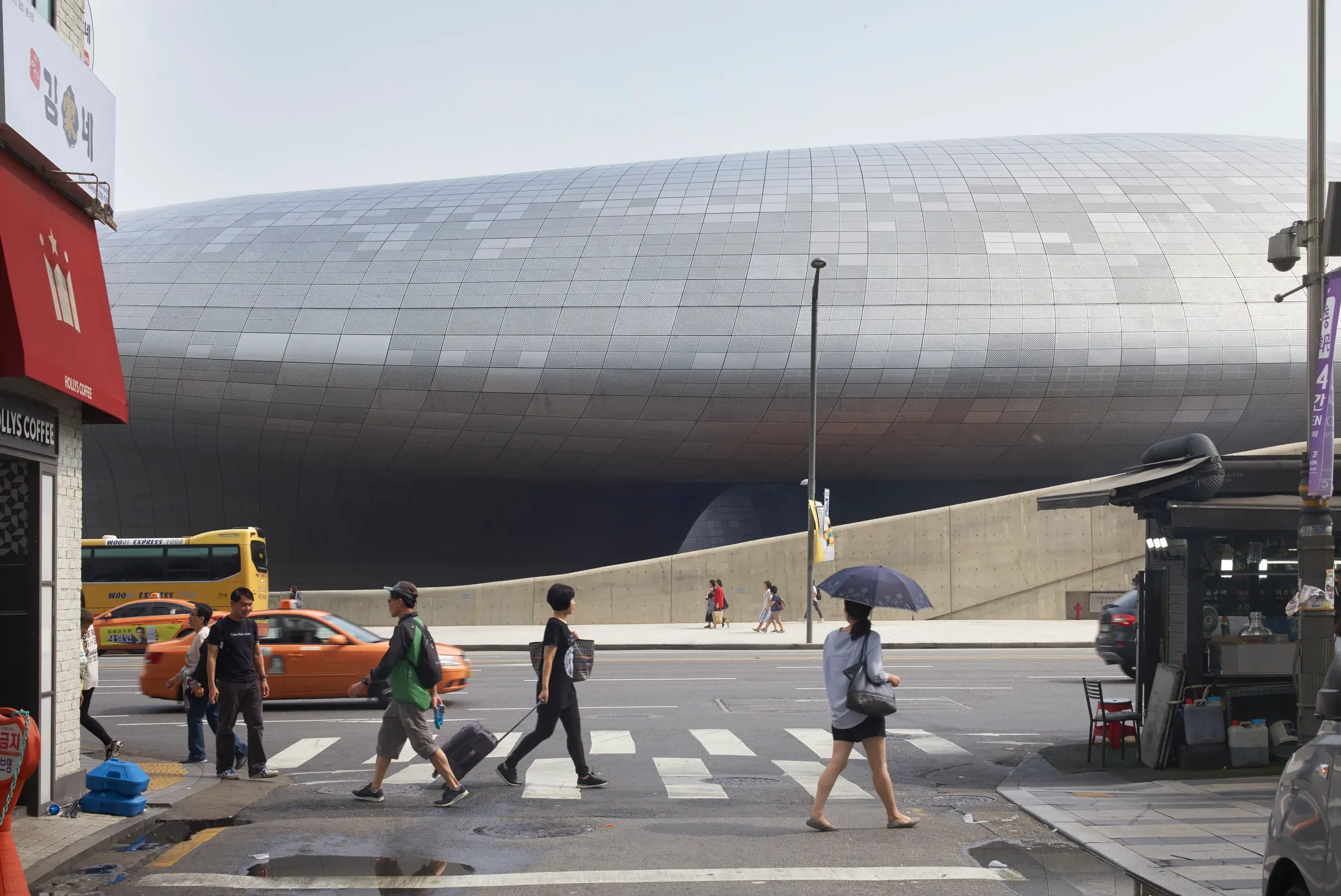 Dongdaemun Design Plaza in Seoul, South Korea, by Zaha Hadid Architects, with sculptural curves and public plaza spaces, Photography Julien Lanoo