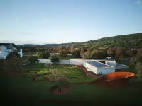 Doshi Retreat on Vitra Campus in Weil am Rhein, Germany, designed by Balkrishna Doshi with Khushnu Panthaki Hoof and Sönke Hoof, Photography Julien Lanoo