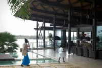 Ebrah Pavilion in Assinie-Mafia, Côte d’Ivoire, showing open-air architecture and lagoon-side living, Photography Julien Lanoo