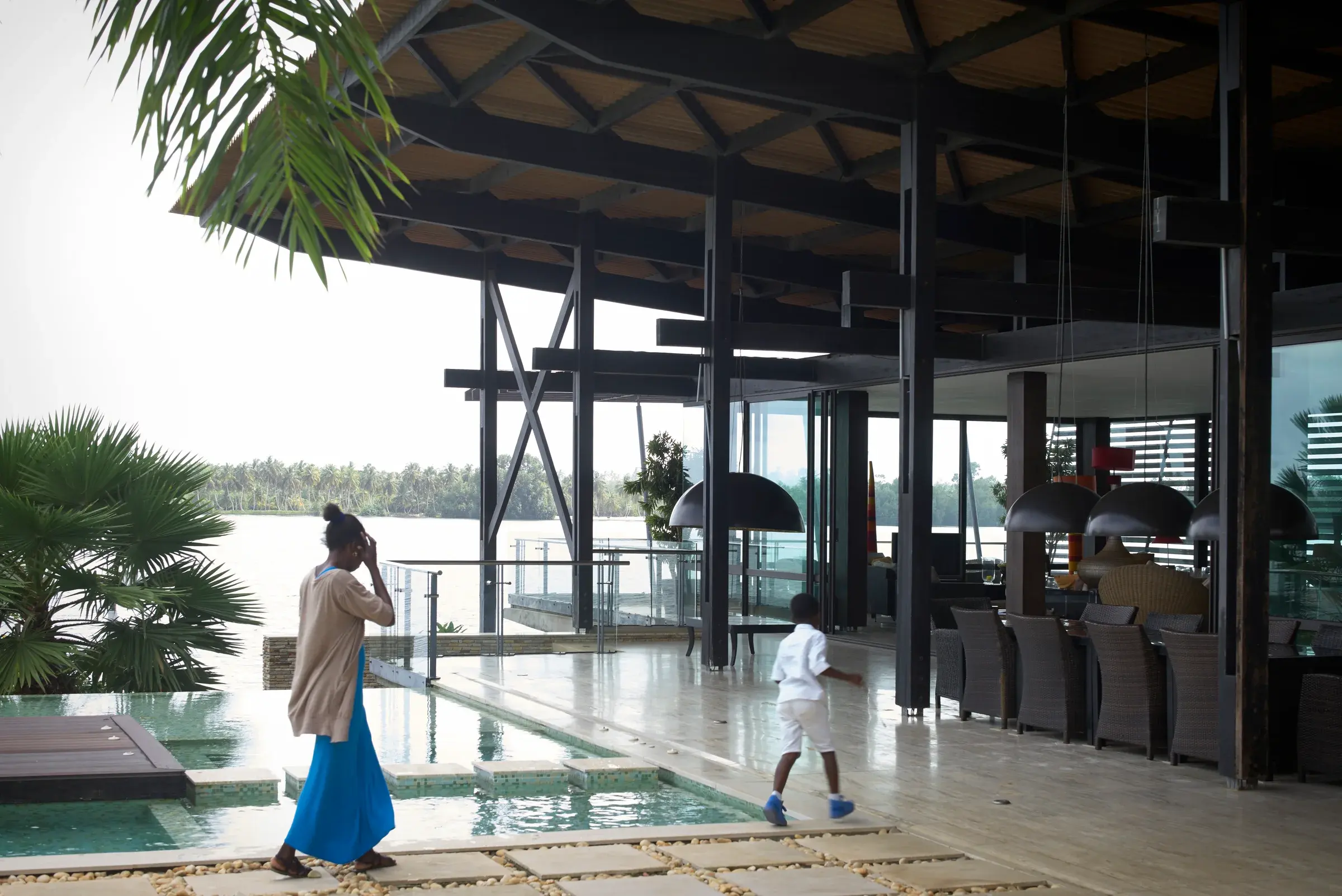 Ebrah Pavilion in Assinie-Mafia, Côte d’Ivoire, showing open-air architecture and lagoon-side living, Photography Julien Lanoo