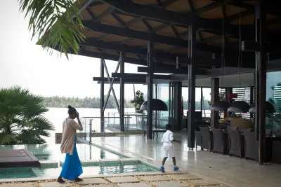 Ebrah Pavilion in Assinie-Mafia, Côte d’Ivoire, showing open-air architecture and lagoon-side living, Photography Julien Lanoo