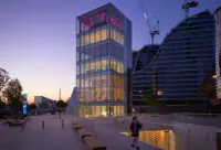 Green Square Library and Plaza by Stewart Hollenstein in Sydney, showing the sunken civic plaza and glass pavilions, Photography Julien Lanoo