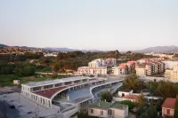 Groupe Scolaire Sainte-Marthe Audisio in Marseille with stepped concrete volumes and rooftop schoolyard, Photography Julien Lanoo