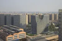 Hangzhou Gateway by Julien De Smedt Architects in Hangzhou, China, with its H-shaped tower and ground-level arch, Photography Julien Lanoo