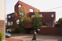 House V_17 brick facade and garden-facing composition in Marcq-en-Barœul, France