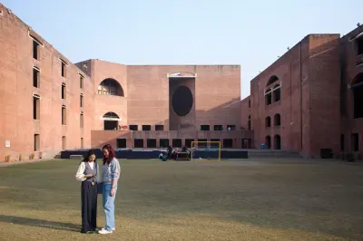 Louis Kahn's Indian Institute of Management in Ahmedabad, with brick geometry and deep shadows, Photography Julien Lanoo