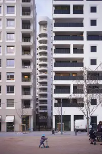 Îlot A3 in Lyon, France, by Herzog & de Meuron, showing the mixed-use block and shared courtyard, Photography Julien Lanoo