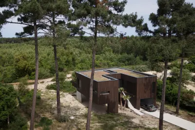 Maison des Landes timber house in Lit-et-Mixe, France, raised among pine trees