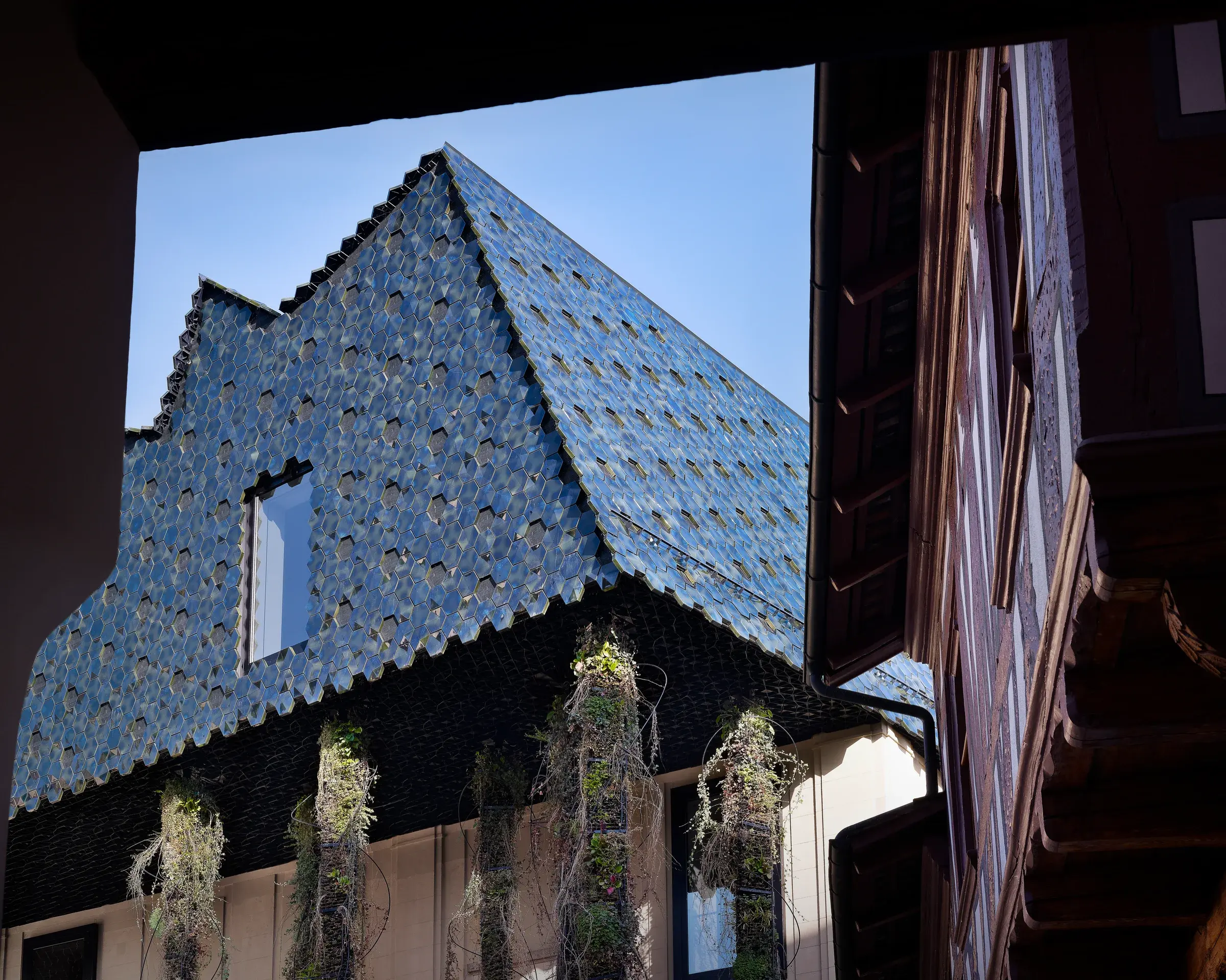 Museum der Kulturen Basel in Basel, Switzerland, with Herzog & de Meuron’s folded ceramic roof