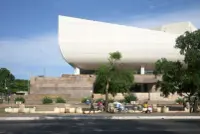 Elevated terrace and exterior geometry of the National Theatre of Ghana in Accra, Ghana, Photography Julien Lanoo