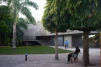 Nubuke Foundation in Accra, Ghana, by NAV_S Baerbel Mueller and TAELON7, showing the exhibition volume above the garden, Photography Julien Lanoo