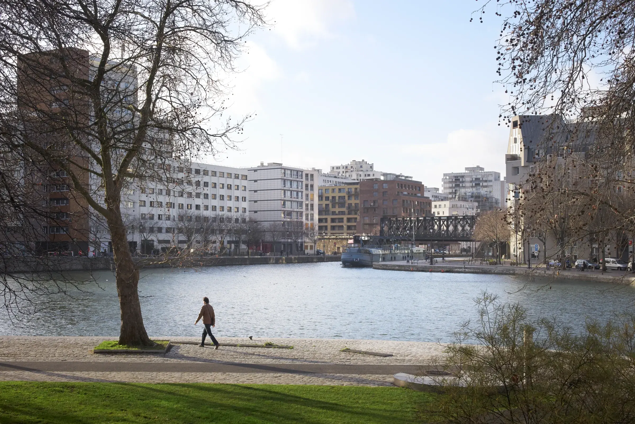 TVK's Ourcq Jaurès in Paris, France, viewed along the Canal de l’Ourcq, Photography Julien Lanoo