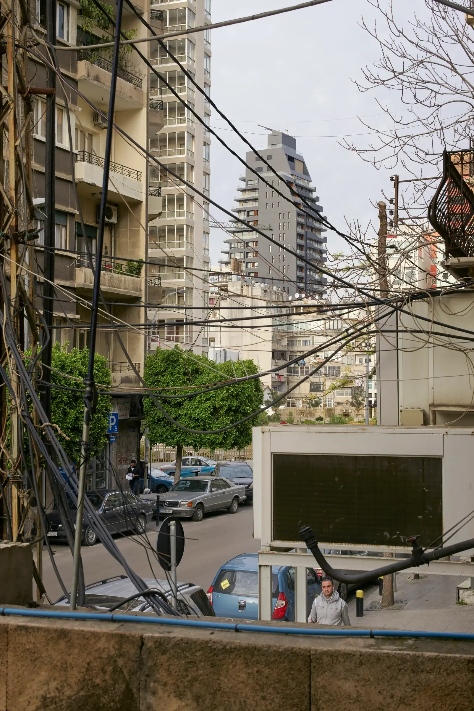 Plot #1072 by Bernard Khoury in Beirut, Lebanon, with a slim vertical form and reflective surfaces, Photography Julien Lanoo