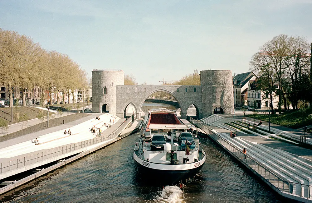 Quai des Salines riverside promenade in Tournai, Belgium, along the Escaut, Photography Julien Lanoo