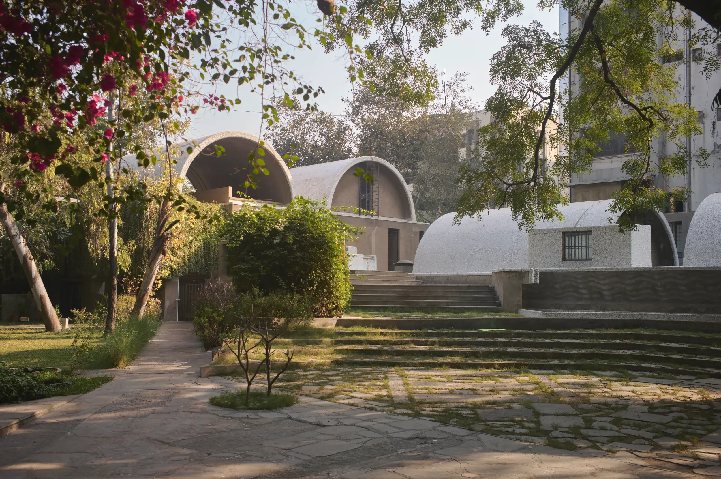 Sangath by Balkrishna Doshi in Ahmedabad, India, showing vaulted architecture and landscape, Photography Julien Lanoo